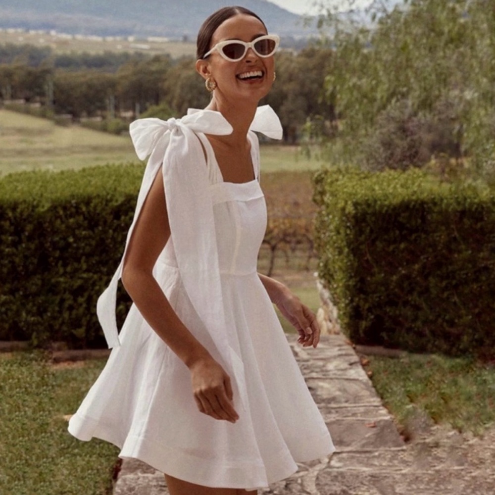 DISSH Aisle White Linen Bow Mini Dress